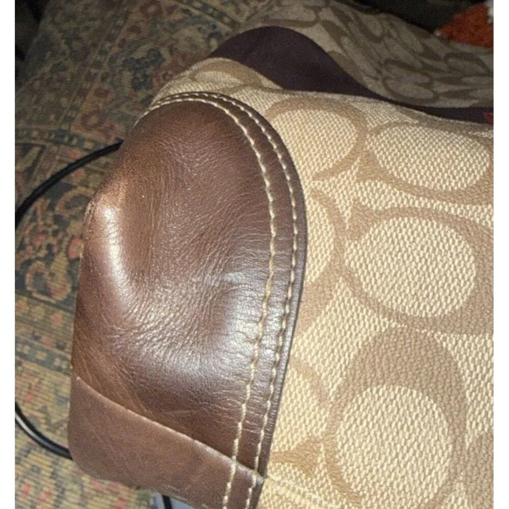 Coach heritage signature